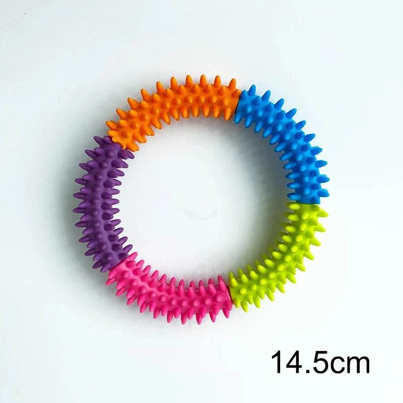PawzPlay Tug &amp; Fetch Training Ring durable rubber dog toy for fetch and tug-of-war in red, orange, and green