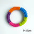 PawzPlay Tug & Fetch Training Ring durable rubber dog toy for fetch and tug-of-war in red, orange, and green