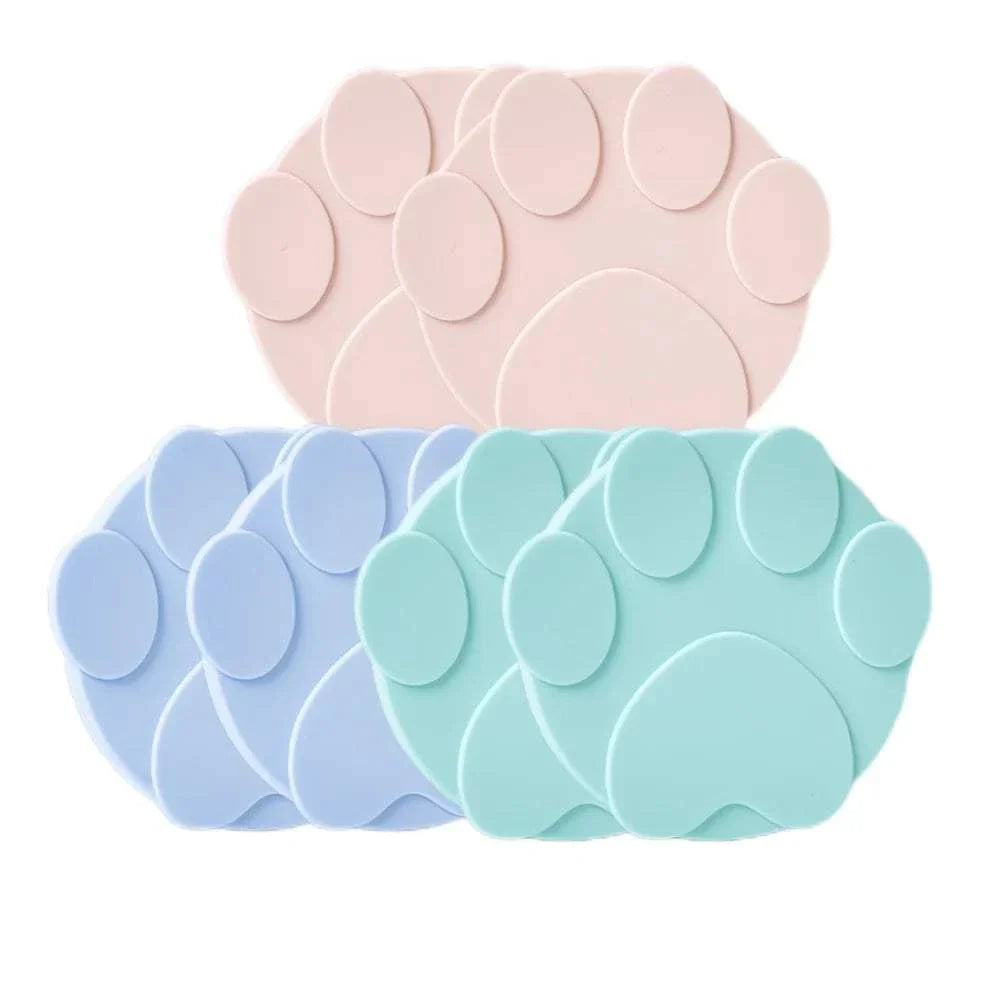 PawSeal 2-in-1 pet can cover and spoon in cat paw shape, reusable silicone lid sealing pet food cans airtight to keep food fresh and reduce waste.